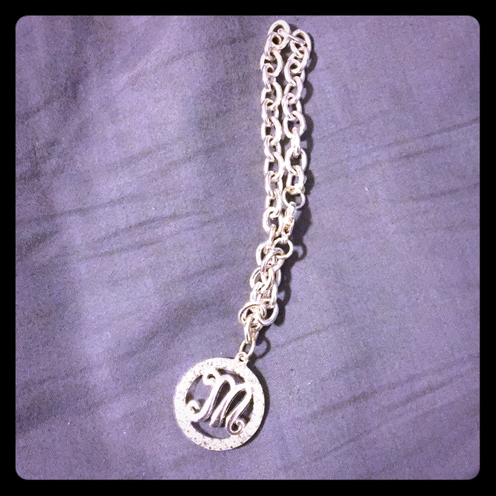 Silver bracelet with M pendant